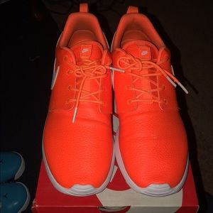 Nike. Size 10. Neon orange.